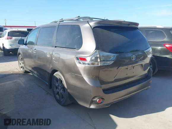 2015 Toyota Sienna SE with VIN 5TDXK3DC3FS684448, listed as a IAAI auction lot 42629958 with 125,645 mi miles and . Bid and sale history available at DreamBid. Image 3.