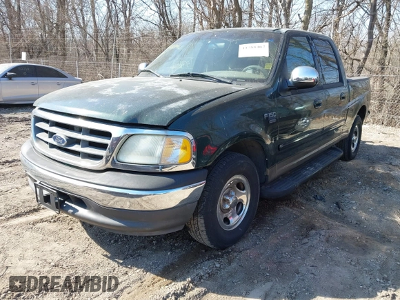 2002 Ford F-150 XLT with VIN 1FTRW07672KB47813, listed as a IAAI auction lot 41788462 with 234,684 mi miles. Bid and sale history available at carsss.com. Image 2.