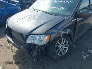 2019 Dodge Grand Caravan SXT with VIN 2C4RDGCG1KR514123, listed as a IAAI auction lot 41777811 with 119,087 mi miles and . Bid and sale history available at DreamBid. Image 6.