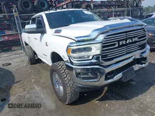 2019 Ram 2500 Lone Star z VIN 3C6UR5DL0KG590912, wystawiony jako IAAI lot #42669594 z przebiegiem 128 789 mil mil oraz . Historia ofert i sprzedaży dostępna na DreamBid. Obrazek 1.
