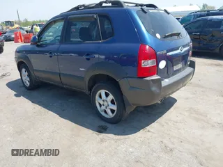 2005 Hyundai Tucson GLS with VIN KM8JN72D15U191616, listed as a IAAI auction lot 42081034 with 217,168 mi miles. Bid and sale history available at carsss.com. Image 3.