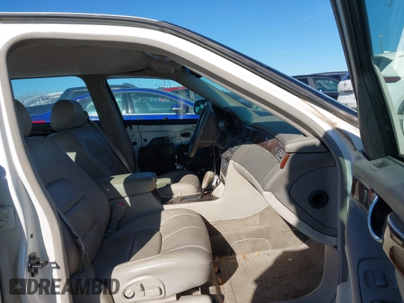 2000 Cadillac DeVille DTS z VIN 1G6KF5793YU222306, wystawiony jako IAAI lot #40810291 z przebiegiem 140 019 mil mil oraz . Historia ofert i sprzedaży dostępna na DreamBid. Obrazek 5.