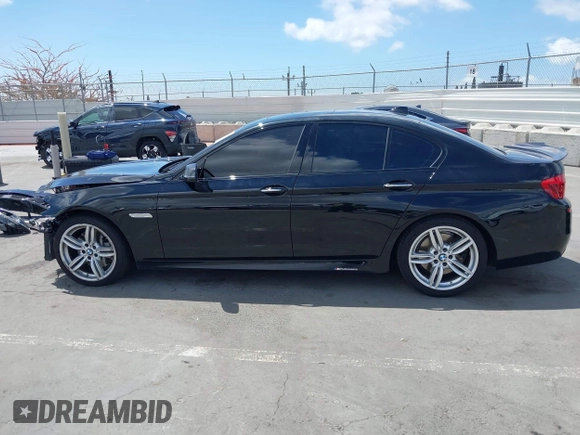 2015 BMW 5 Series 550i with VIN WBAKN9C5XFD961631, listed as a IAAI auction lot 42248127 with 30,821 mi miles and . Bid and sale history available at DreamBid. Image 15.