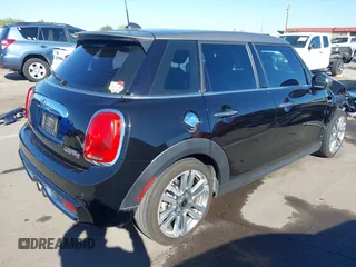2017 MINI Hardtop 4 Door Cooper S z VIN WMWXU3C56H2D33072, wystawiony jako IAAI lot #41847726 z przebiegiem 81 783 mil mil oraz . Historia ofert i sprzedaży dostępna na DreamBid. Obrazek 4.