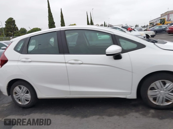 2020 Honda Fit LX with VIN 3HGGK5H41LM715918, listed as a IAAI auction lot 42779329 with 50,898 mi miles and . Bid and sale history available at DreamBid. Image 14.