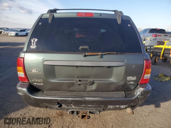 2004 Jeep Grand Cherokee with VIN 1J8GW48N24C304268, listed as a Copart auction lot 45559065 with 252,903 mi miles and Salvage title. Bid and sale history available at DreamBid. Image 6.
