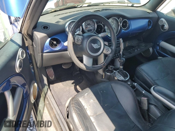 2006 MINI Convertible S with VIN WMWRH33566TK58973, listed as a Copart auction lot 51295575 with Not provided miles and Salvage title. Bid and sale history available at DreamBid. Image 8.