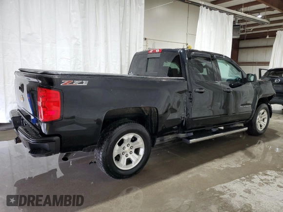 2017 Chevrolet Silverado 1500 LT with VIN 1GCVKREC0HZ141018, listed as a Copart auction lot 52708255 with 96,790 mi miles and Salvage Title. Bid and sale history available at DreamBid. Image 3.