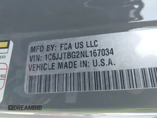 2022 Jeep Gladiator Rubicon z VIN 1C6JJTBG2NL167034, wystawiony jako IAAI lot #41854225 z przebiegiem Nie podano mil oraz . Historia ofert i sprzedaży dostępna na DreamBid. Obrazek 9.