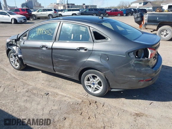 2017 Ford Fiesta SE with VIN 3FADP4BJ0HM117117, listed as a IAAI auction lot 41983052 with 99,186 mi miles. Bid and sale history available at carsss.com. Image 3.