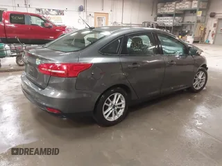 2016 Ford Focus SE with VIN 1FADP3F21GL247906, listed as a IAAI auction lot 42043546 with 124,532 mi miles and . Bid and sale history available at DreamBid. Image 4.