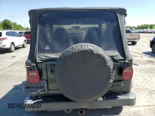 2002 Jeep Wrangler Sport с VIN 1J4FA49SX2P738105, выставлен на аукционе Copart как лот 60320775 с пробегом 402 518 миль миль и Списание • Salvage title. История ставок и продаж доступна на DreamBid. Изображение 6.