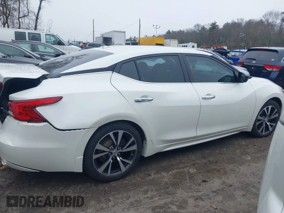 2016 Nissan Maxima S with VIN 1N4AA6AP2GC412533, listed as a IAAI auction lot 41831813 with 122,933 mi miles and . Bid and sale history available at DreamBid. Image 13.