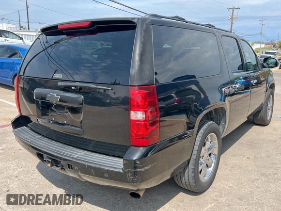 2008 Chevrolet Suburban LTZ with VIN 1GNFC16018R193868, listed as a Copart auction lot 50950405 with 193,219 mi miles and Clean title. Bid and sale history available at DreamBid. Image 4.