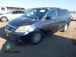 2008 Honda Odyssey LX with VIN 5FNRL382X8B043313, listed as a IAAI auction lot 42085879 with 164,522 mi miles. Bid and sale history available at carsss.com. Image 2.