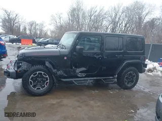 2015 Jeep Wrangler Unlimited Rubicon Hard Rock with VIN 1C4HJWFG9FL569962, listed as a IAAI auction lot 41557801 with 78,597 mi miles. Bid and sale history available at carsss.com. Image 14.