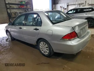 2006 Mitsubishi Lancer ES with VIN JA3AJ26E36U065974, listed as a Copart auction lot 52081885 with 201,728 mi miles and Salvage Title. Bid and sale history available at carsss.com. Image 2.