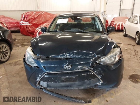 2016 Scion iA z VIN 3MYDLBZV5GY103533, wystawiony jako IAAI lot #41756270 z przebiegiem 59 290 mil mil oraz . Historia ofert i sprzedaży dostępna na DreamBid. Obrazek 12.