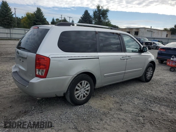 2012 Kia Sedona LX with VIN KNDMG4C79C6496785, listed as a Copart auction lot 73310344 with 130,243 mi miles and Salvage Title. Bid and sale history available at carsss.com. Image 3.
