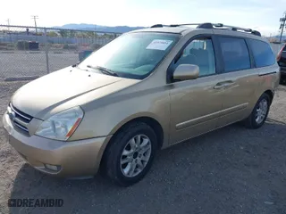 2006 Kia Sedona LX with VIN KNDMB233666040795, listed as a IAAI auction lot 41921051 with 200,410 mi miles. Bid and sale history available at carsss.com. Image 2.