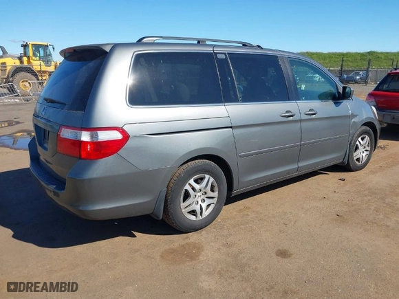 2007 Honda Odyssey EX-L with VIN 5FNRL386X7B405321, listed as a IAAI auction lot 41703384 with 198,552 mi miles. Bid and sale history available at carsss.com. Image 4.