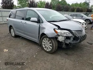 2015 Toyota Sienna LE with VIN 5TDJK3DC5FS120127, listed as a Copart auction lot 60461345 with 152,368 mi miles and Salvage title. Bid and sale history available at DreamBid. Image 14.