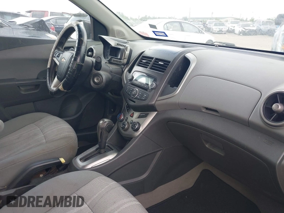2013 Chevrolet Sonic LT with VIN 1G1JC5SH3D4255079, listed as a IAAI auction lot 42167910 with Not Provided miles and . Bid and sale history available at DreamBid. Image 5.