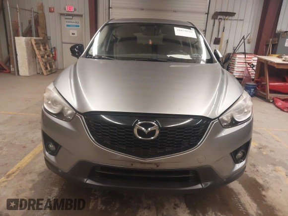 2014 Mazda CX-5 Grand Touring with VIN JM3KE4DY5E0305882, listed as a IAAI auction lot 41879532 with 173,443 mi miles. Bid and sale history available at carsss.com. Image 12.