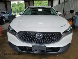 2023 Mazda CX-30 S Select z VIN 3MVDMBBM2PM521471, wystawiony jako Copart lot #63272965 z przebiegiem 26 879 mil mil oraz Szkoda całkowita • Salvage title. Historia ofert i sprzedaży dostępna na DreamBid. Obrazek 5.
