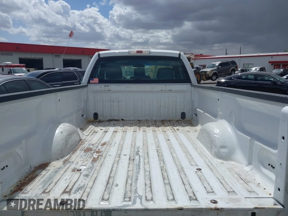 2014 Ford F-150 XL with VIN 1FTMF1CM4EKE98669, listed as a IAAI auction lot 41927986 with 133,246 mi miles and . Bid and sale history available at DreamBid. Image 8.