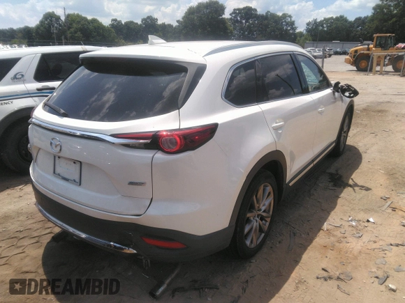 2017 Mazda CX-9 Signature with VIN JM3TCBEY2H0140598, listed as a IAAI auction lot 42561999 with 61,574 mi miles and . Bid and sale history available at DreamBid. Image 4.