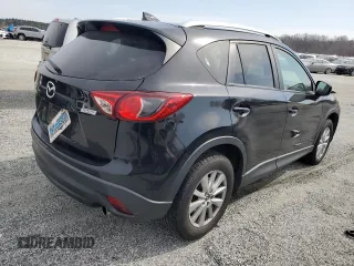 2016 Mazda CX-5 Touring with VIN JM3KE2CY1G0654434, listed as a Copart auction lot 48974115 with 83,977 mi miles and Salvage Title. Bid and sale history available at carsss.com. Image 3.
