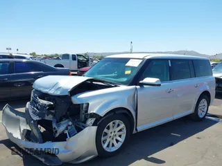 2011 Ford Flex SEL z VIN 2FMGK5CC6BBD33666, wystawiony jako IAAI lot #42237123 z przebiegiem 205 239 mil mil oraz . Historia ofert i sprzedaży dostępna na DreamBid. Obrazek 2.