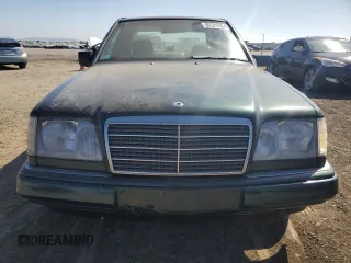 1995 Mercedes-Benz E Class with VIN WDBEA32E4SC205978, listed as a Copart auction lot 60329354 with 240,082 mi miles and Salvage Title. Bid and sale history available at carsss.com. Image 5.