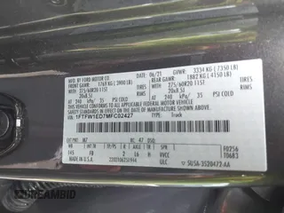 2021 Ford F-150 XL z VIN 1FTFW1ED7MFC02427, wystawiony jako IAAI lot #42336224 z przebiegiem 106 988 mil mil oraz . Historia ofert i sprzedaży dostępna na DreamBid. Obrazek 9.
