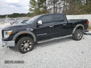 2016 Nissan Titan XD PRO-4X with VIN 1N6BA1F49GN501369, listed as a Copart auction lot 47060925 with 157,269 mi miles and Clean Title. Bid and sale history available at carsss.com. Image 1.