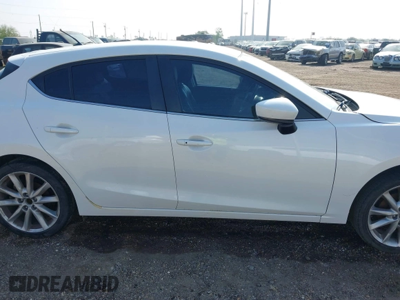 2017 Mazda 3 Touring with VIN 3MZBN1L77HM157118, listed as a IAAI auction lot 41734627 with 132,452 mi miles and . Bid and sale history available at DreamBid. Image 13.
