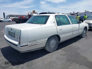 1999 Cadillac DeVille DHS z VIN 1G6KE54Y3XU714363, wystawiony jako IAAI lot #42257217 z przebiegiem 287 542 mil mil oraz . Historia ofert i sprzedaży dostępna na DreamBid. Obrazek 6.