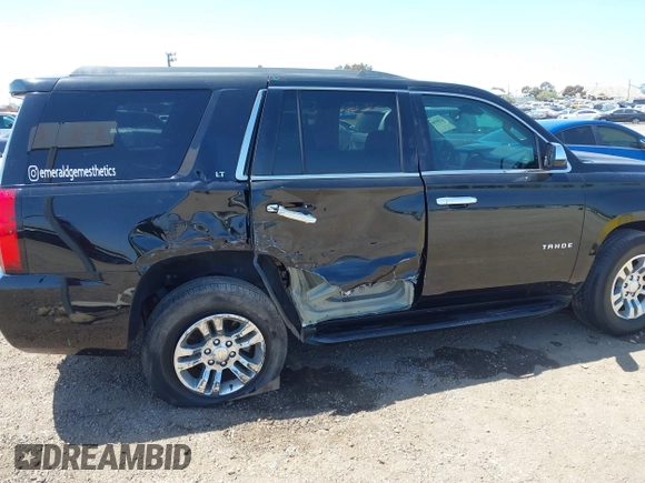 2015 Chevrolet Tahoe LT with VIN 1GNSCBKC8FR612607, listed as a IAAI auction lot 42099907 with 138,037 mi miles and . Bid and sale history available at DreamBid. Image 6.