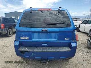 2012 Ford Escape XLT z VIN 1FMCU9DG4CKB11880, wystawiony jako Copart lot #61554935 z przebiegiem 139 385 mil mil oraz Szkoda całkowita • Salvage title. Historia ofert i sprzedaży dostępna na DreamBid. Obrazek 6.