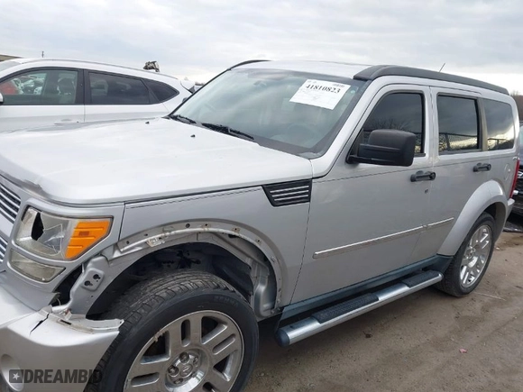 2011 Dodge Nitro Heat with VIN 1D4PU4GK6BW607590, listed as a IAAI auction lot 41810823 with 87,179 mi miles. Bid and sale history available at carsss.com. Image 14.