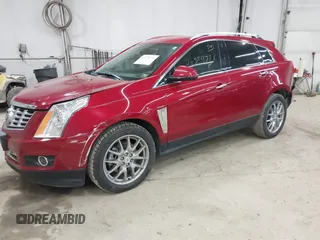 2014 Cadillac SRX Performance Collection z VIN 3GYFNCE30ES596415, wystawiony jako IAAI lot #42329771 z przebiegiem 71 620 mil mil oraz . Historia ofert i sprzedaży dostępna na DreamBid. Obrazek 17.