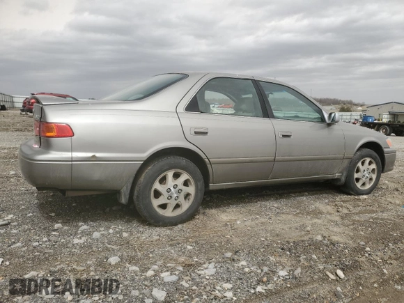 2000 Toyota Camry CE with VIN JT2BG22K6Y0471945, listed as a Copart auction lot 48932715 with Not Provided miles and Salvage Title. Bid and sale history available at DreamBid. Image 3.