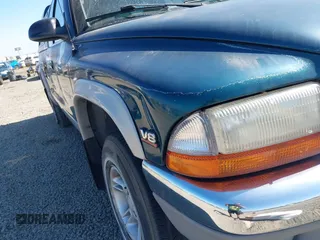 1999 Dodge Dakota SLT with VIN 1B7GG22Y2XS157214, listed as a IAAI auction lot 39776504 with 144,928 mi miles and . Bid and sale history available at carsss.com. Image 6.