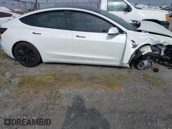 2024 Tesla Model 3 Long Range with VIN 5YJ3E1EB7RF854092, listed as a IAAI auction lot 41697646 with 7,371 mi miles and . Bid and sale history available at DreamBid. Image 13.