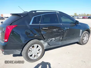 2015 Cadillac SRX with VIN 3GYFNAE30FS573125, listed as a IAAI auction lot 40972187 with 122,612 mi miles and . Bid and sale history available at DreamBid. Image 6.
