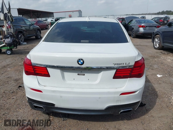 2015 BMW 7 Series 750Li with VIN WBAYE8C54FD780951, listed as a IAAI auction lot 41813038 with 103,131 mi miles. Bid and sale history available at carsss.com. Image 16.