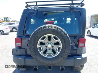 2013 Jeep Wrangler Sport with VIN 1C4AJWAG3DL627179, listed as a IAAI auction lot 42262246 with 33,536 mi miles and . Bid and sale history available at DreamBid. Image 16.