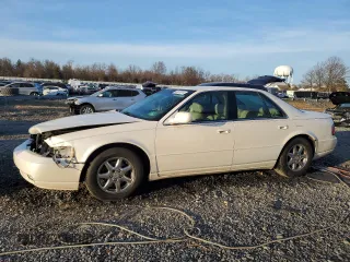 1998 Cadillac Seville STS z VIN 1G6KY5492WU913192, wystawiony jako Copart lot #82323814 z przebiegiem 155 235 mil mil oraz Szkody całkowita. Historia ofert i sprzedaży dostępna na DreamBid. Obrazek 1.