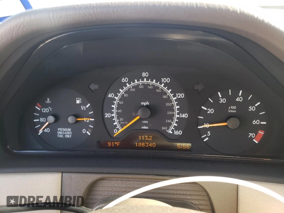 1996 Mercedes-Benz E-Class with VIN WDBJF55F7TJ022765, listed as a Copart auction lot 70577504 with 186,340 mi miles and Salvage Title. Bid and sale history available at carsss.com. Image 9.